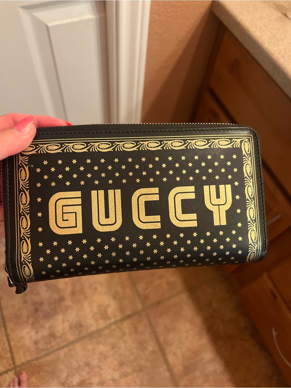 Gucci Black and Gold 'GUCCY' Zip Wallet